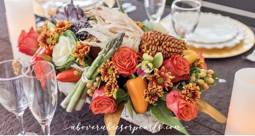 A Thanksgiving centerpiece on a formal dining table