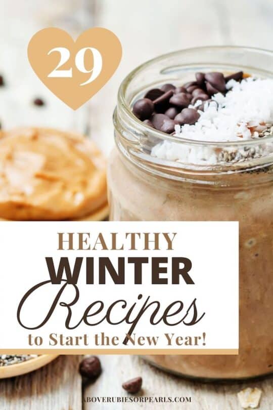 A jar of overnight chocolate oats are topped with chocolate chips and coconut flakes