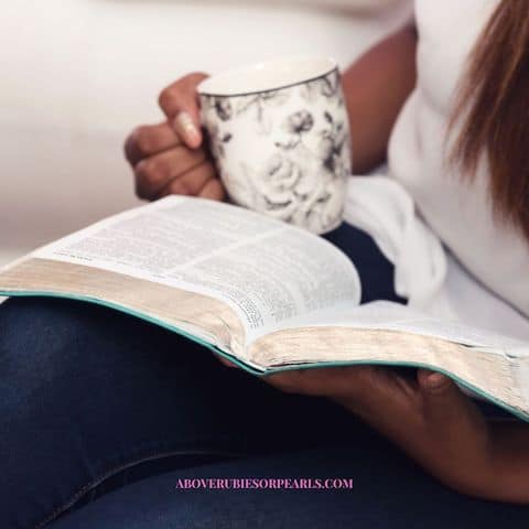 A lady is living set apart by spending time reading God's Word.